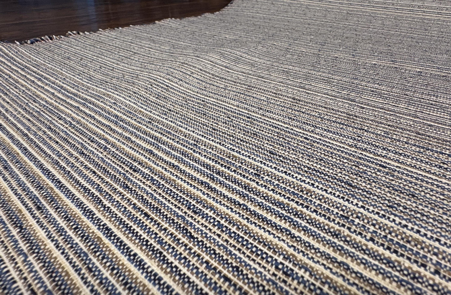Kravet Stripe Woven Fabric with shades of beige, blue, and black. Shop now at American Fabric Prints.
