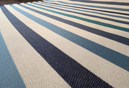 Striped Seasonal Outdoor Fabric Pattern. Varying Shades of Blue Stripes. Teal Stripe, Navy Blue Stripe, and Columbia Blue Stripe Woven Fabric. Shop now at American Fabric Prints.