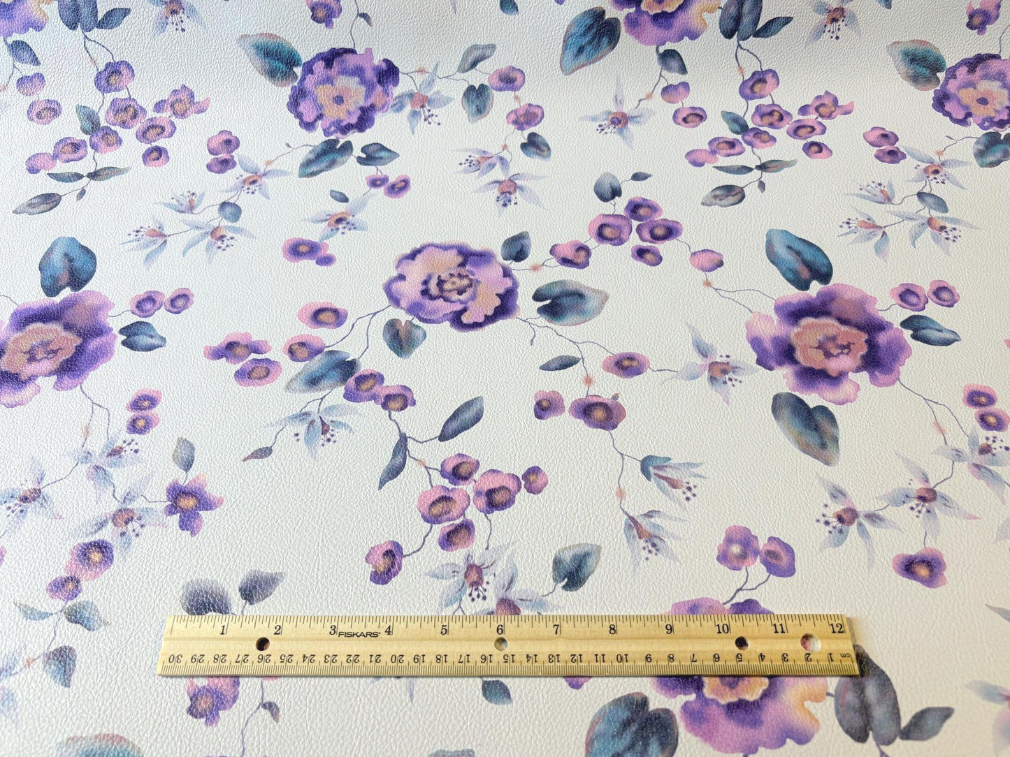 Floral Vinyl Fabric with Purple Flowers & Greenish Blue Leaves. Shop now at American Fabric Prints.
