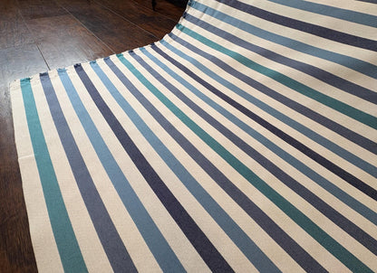 Striped Seasonal Outdoor Fabric Pattern. Varying Shades of Blue Stripes. Teal Stripe, Navy Blue Stripe, and Columbia Blue Stripe Woven Fabric. Shop now at American Fabric Prints.