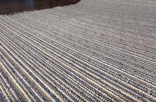Kravet Stripe Woven Fabric with shades of beige, blue, and black. Shop now at American Fabric Prints.