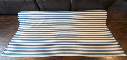 Striped Seasonal Outdoor Fabric Pattern. Varying Shades of Blue Stripes. Teal Stripe, Navy Blue Stripe, and Columbia Blue Stripe Woven Fabric. Shop now at American Fabric Prints.